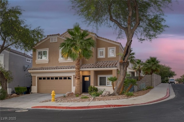 1246 Diamond Valley St, Henderson, NV 89052 - multi unit property featuring a tiled roof, a garage, concrete driveway, and stucco siding