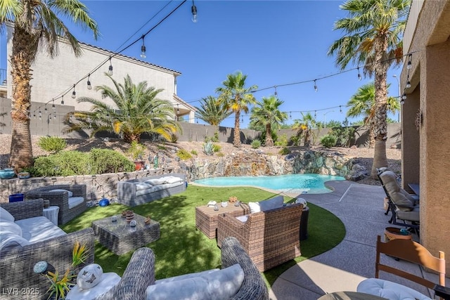 1246 Diamond Valley St, Henderson, NV 89052 - fenced backyard featuring a patio and an outdoor hangout area