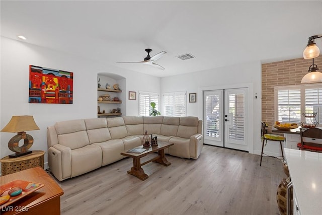 1246 Diamond Valley St, Henderson, NV 89052 - living area featuring light wood-style floors, healthy amount of natural light, and a ceiling fan