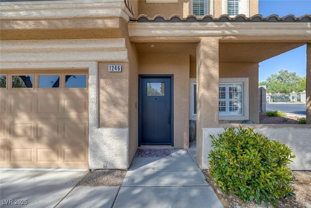 1246 Diamond Valley St, Henderson, NV 89052 - entrance to property featuring stucco siding and a garage