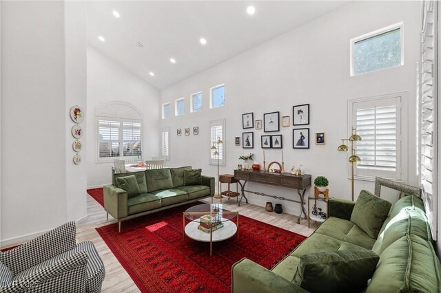 9105 Chenin Ave, Las Vegas, NV 89129 - living room featuring high vaulted ceiling, light wood finished floors, and recessed lighting