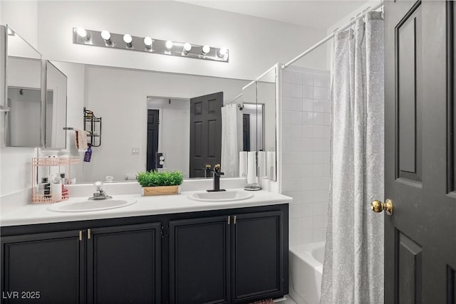9105 Chenin Ave, Las Vegas, NV 89129 - bathroom featuring double vanity and shower / bath combo