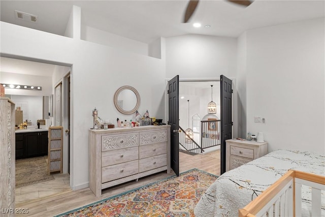 9105 Chenin Ave, Las Vegas, NV 89129 - bedroom featuring ensuite bathroom and high vaulted ceiling