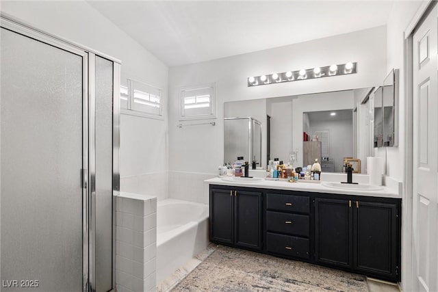 9105 Chenin Ave, Las Vegas, NV 89129 - full bathroom with a stall shower, a bath, and double vanity
