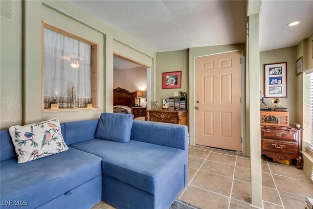 3877 Platis Cir, Las Vegas, NV 89103 - living area featuring light tile patterned flooring