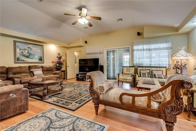 3877 Platis Cir, Las Vegas, NV 89103 - living room featuring ceiling fan, lofted ceiling, and wood finished floors