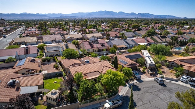 3877 Platis Cir, Las Vegas, NV 89103 - aerial perspective of suburban area featuring mountains