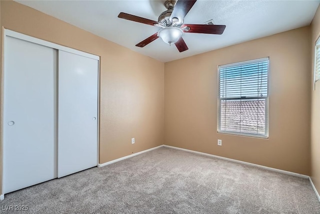 3141 Diamond Crest Ln, Henderson, NV 89052 - unfurnished bedroom featuring carpet, a closet, and ceiling fan