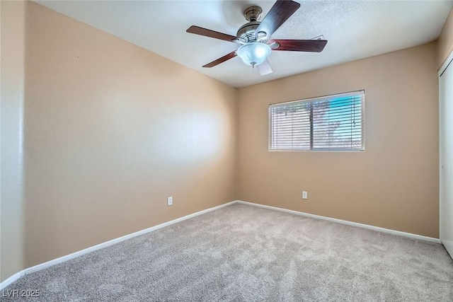 3141 Diamond Crest Ln, Henderson, NV 89052 - carpeted empty room with baseboards and a ceiling fan
