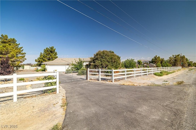 170 Dove St, Pahrump, NV 89060 - view of front of house with driveway and a gate