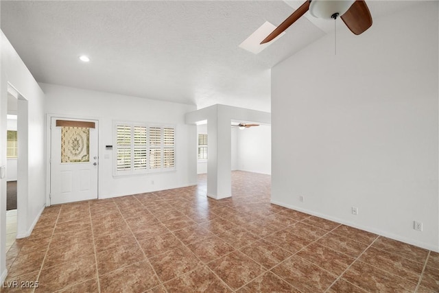 170 Dove St, Pahrump, NV 89060 - unfurnished living room with ceiling fan and recessed lighting