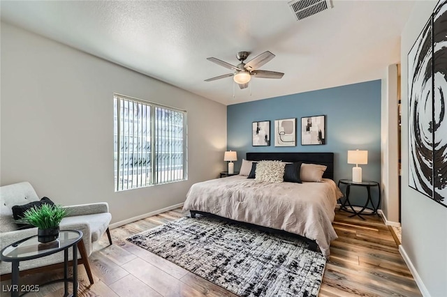 3125 N Buffalo Dr Unit 1133, Las Vegas, NV 89128 - bedroom with wood finished floors and ceiling fan