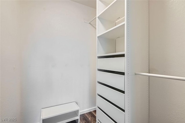 3125 N Buffalo Dr Unit 1133, Las Vegas, NV 89128 - walk in closet with dark wood-type flooring