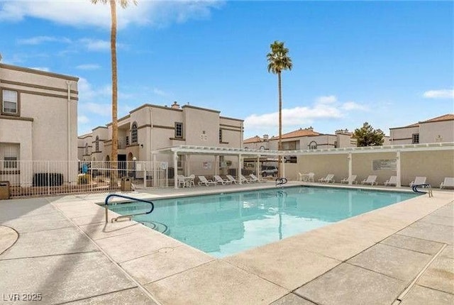 3125 N Buffalo Dr Unit 1133, Las Vegas, NV 89128 - community pool featuring a patio