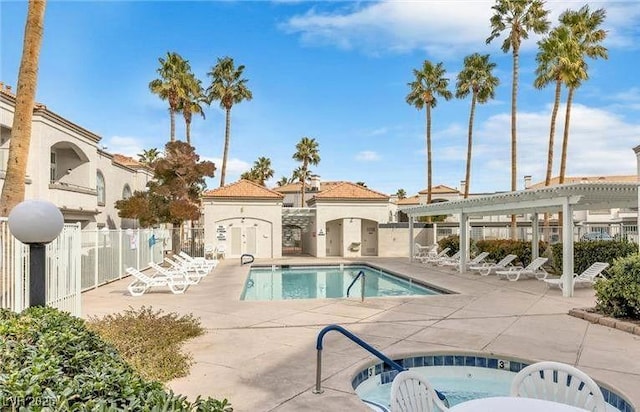 3125 N Buffalo Dr Unit 1133, Las Vegas, NV 89128 - community pool featuring a hot tub, a pergola, and a patio