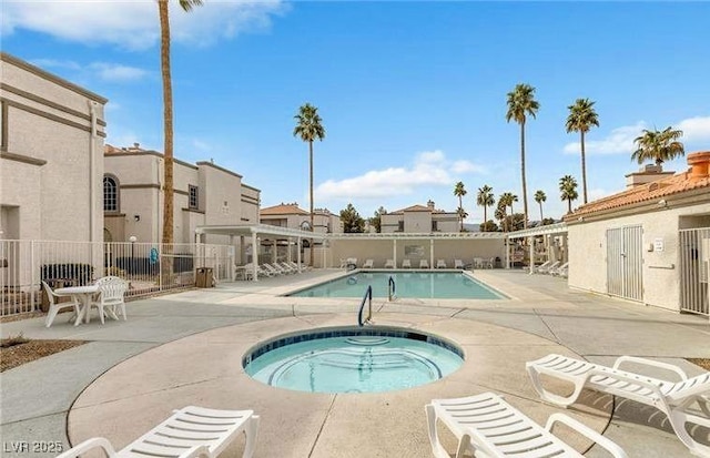 3125 N Buffalo Dr Unit 1133, Las Vegas, NV 89128 - community pool featuring a hot tub and a patio