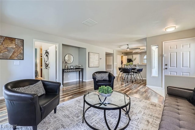 3125 N Buffalo Dr Unit 1133, Las Vegas, NV 89128 - living room with light wood-style flooring and a ceiling fan