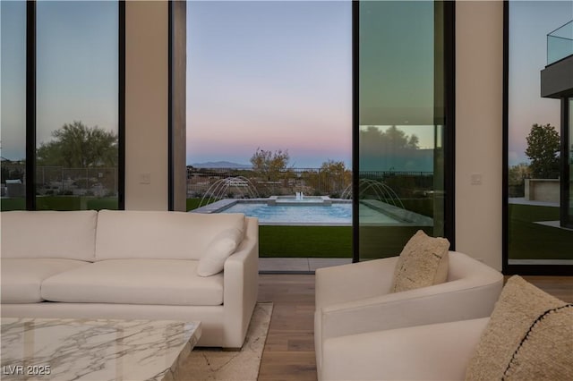 68 Sun Glow Ln, Las Vegas, NV 89135 - living room with wood finished floors and healthy amount of natural light