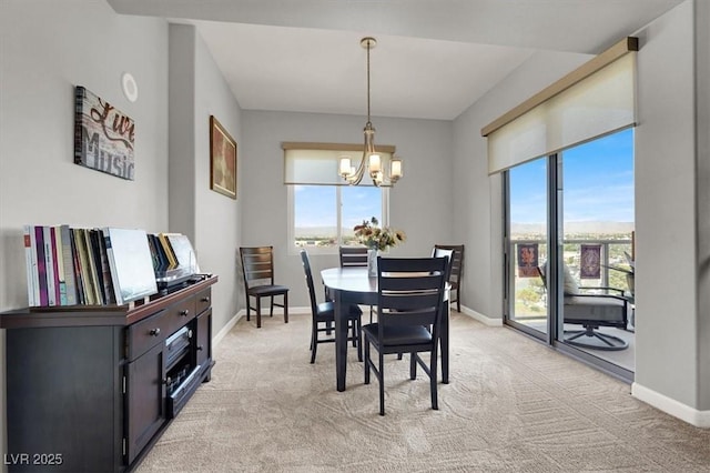 8255 Las Vegas Blvd Unit 722, Las Vegas, NV 89123 - dining room with light colored carpet, a chandelier, and plenty of natural light