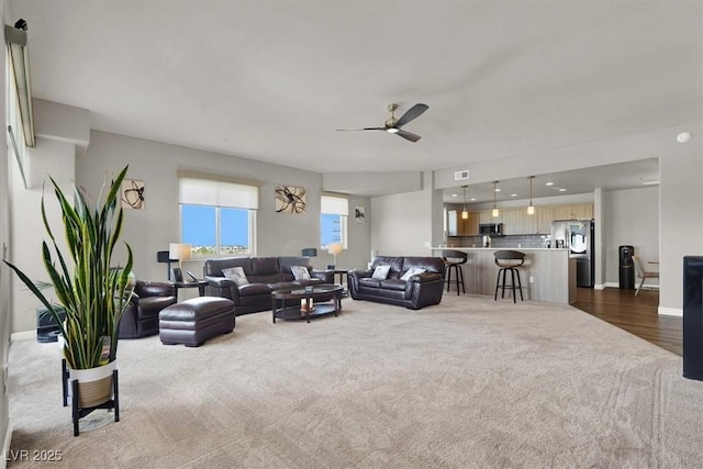 8255 Las Vegas Blvd Unit 722, Las Vegas, NV 89123 - living room with dark colored carpet and a ceiling fan