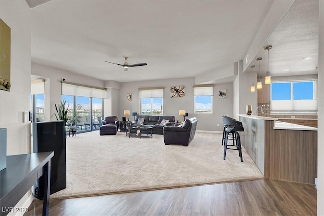 8255 Las Vegas Blvd Unit 722, Las Vegas, NV 89123 - living area featuring ceiling fan and light wood-style flooring
