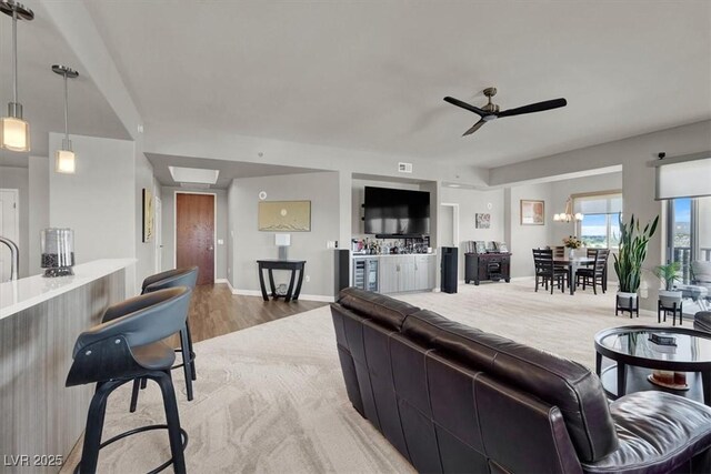 8255 Las Vegas Blvd Unit 722, Las Vegas, NV 89123 - living area featuring ceiling fan and light wood-style floors