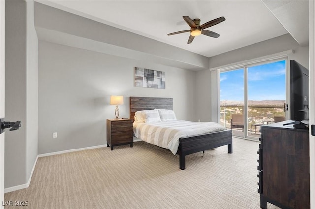 8255 Las Vegas Blvd Unit 722, Las Vegas, NV 89123 - bedroom featuring access to outside, light colored carpet, and ceiling fan