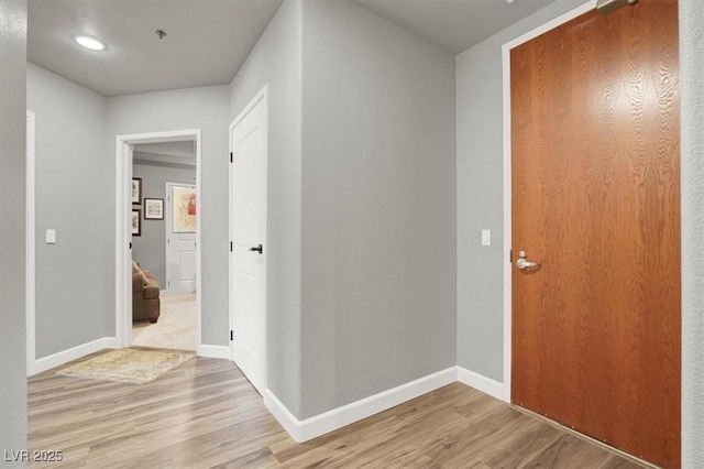 8255 Las Vegas Blvd Unit 722, Las Vegas, NV 89123 - hallway featuring light wood-type flooring and recessed lighting