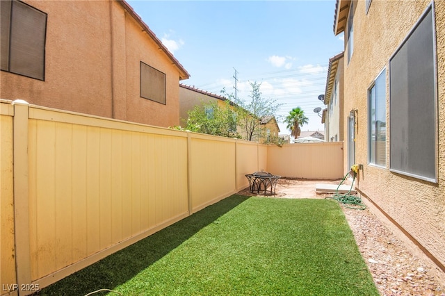 5674 Moccasin Point St, Las Vegas, NV 89148 - fenced backyard with a patio area