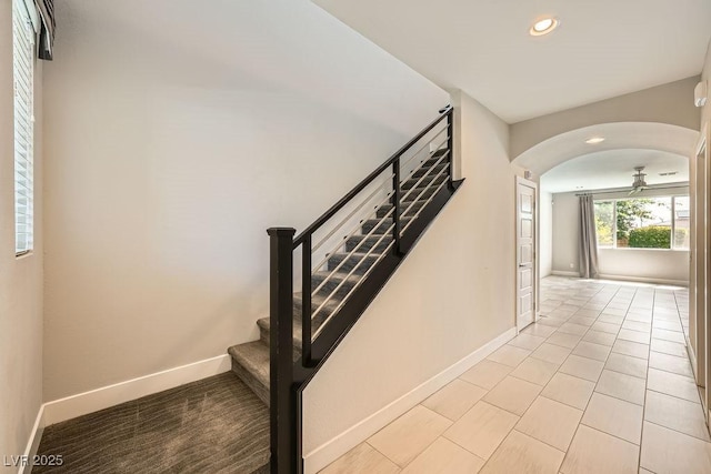 8048 Skye Bridge St, Las Vegas, NV 89166 - stairway with arched walkways, recessed lighting, and a ceiling fan