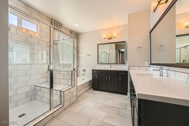 8048 Skye Bridge St, Las Vegas, NV 89166 - full bath featuring a stall shower, a garden tub, and vanity