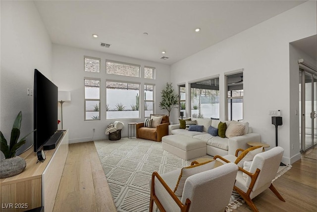 9789 Twilight Moon Ave, Las Vegas, NV 89148 - living room with hardwood / wood-style flooring and recessed lighting