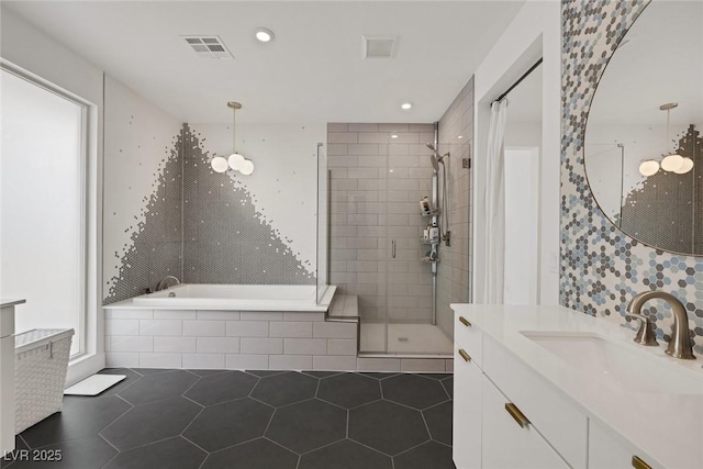 9789 Twilight Moon Ave, Las Vegas, NV 89148 - full bath with vanity, tile patterned flooring, a bath, a stall shower, and recessed lighting