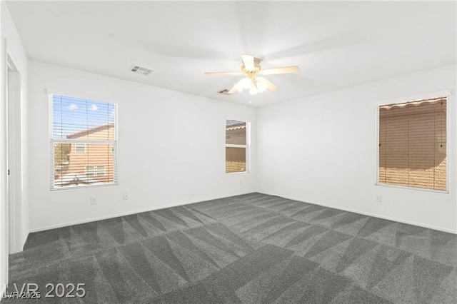 11755 Garland Grove Ln, Las Vegas, NV 89183 - spare room with dark carpet and ceiling fan