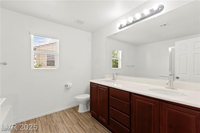 11755 Garland Grove Ln, Las Vegas, NV 89183 - full bath with wood finished floors and double vanity