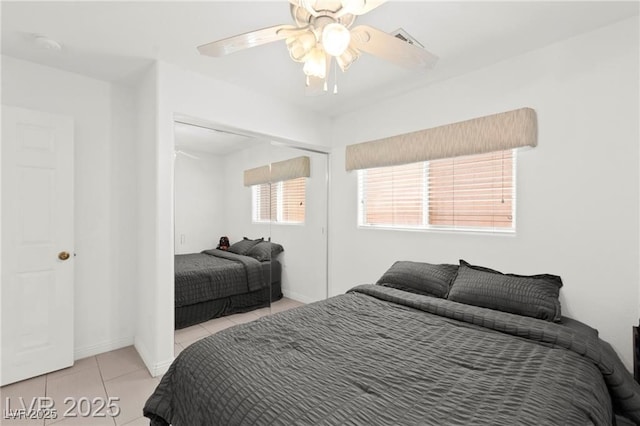 11755 Garland Grove Ln, Las Vegas, NV 89183 - tiled bedroom featuring a closet and a ceiling fan