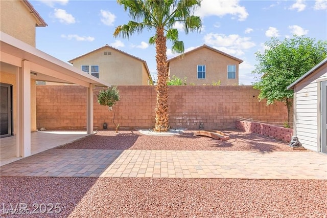 11755 Garland Grove Ln, Las Vegas, NV 89183 - fenced backyard featuring a patio area