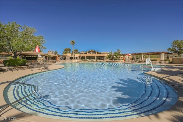 15 Emerald Dunes Cir, Henderson, NV 89052 - community pool featuring a patio