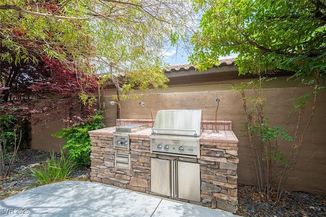15 Emerald Dunes Cir, Henderson, NV 89052 - view of patio / terrace featuring exterior kitchen