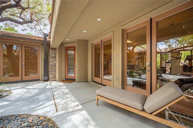 15 Emerald Dunes Cir, Henderson, NV 89052 - view of patio / terrace featuring french doors