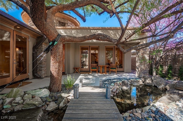 15 Emerald Dunes Cir, Henderson, NV 89052 - view of patio / terrace featuring french doors