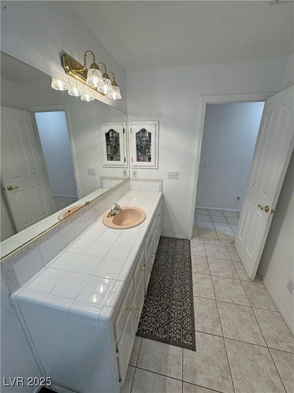 3110 National Ave, Pahrump, NV 89048 - bathroom featuring vanity and tile patterned flooring