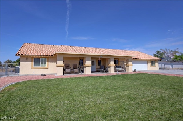 3110 National Ave, Pahrump, NV 89048 - back of property featuring stucco siding, a tile roof, a garage, and driveway