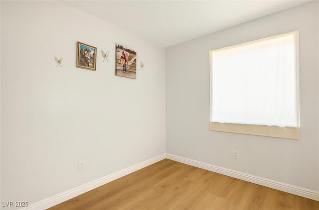 4314 Flaming Ridge Trl, Las Vegas, NV 89147 - spare room featuring light wood-style floors and baseboards