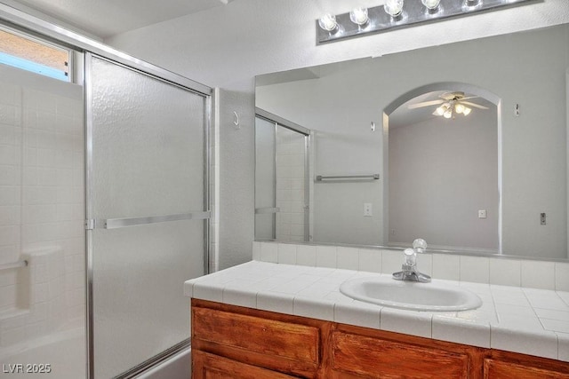901 Nevada Sky St, Las Vegas, NV 89128 - full bathroom with vanity, ceiling fan, and combined bath / shower with glass door