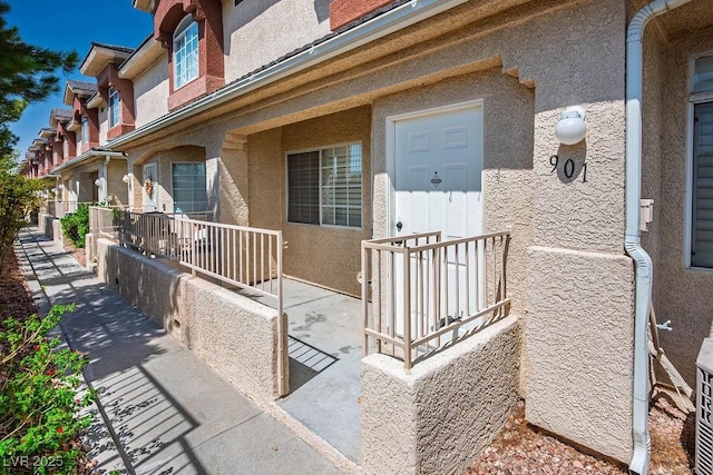 901 Nevada Sky St, Las Vegas, NV 89128 - view of exterior entry featuring stucco siding
