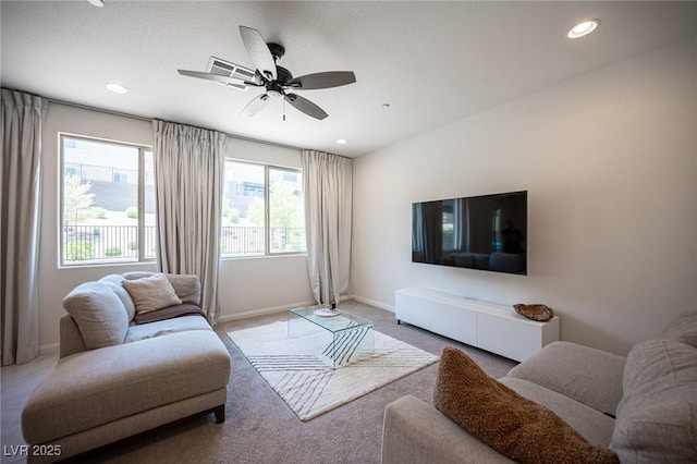 9451 Lunar Ray St, Las Vegas, NV 89143 - carpeted living area with ceiling fan and recessed lighting
