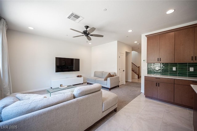 9451 Lunar Ray St, Las Vegas, NV 89143 - living area featuring recessed lighting, a ceiling fan, stairs, and light carpet