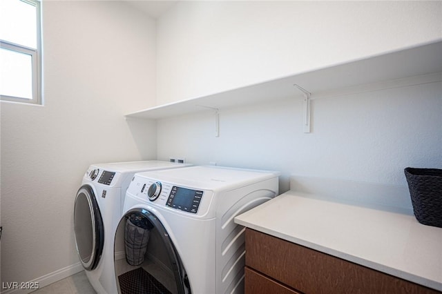 9451 Lunar Ray St, Las Vegas, NV 89143 - laundry room with washer and dryer and baseboards
