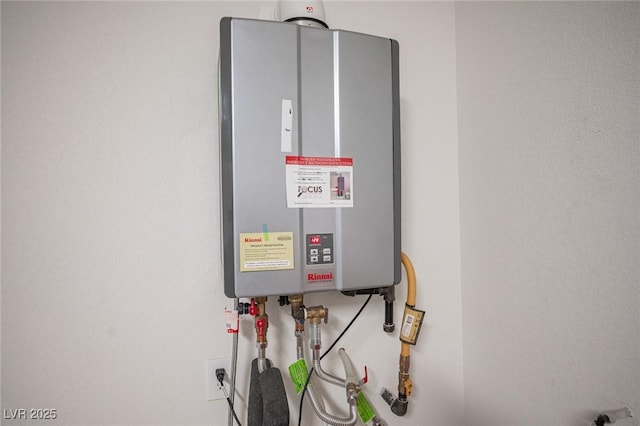 9451 Lunar Ray St, Las Vegas, NV 89143 - utility room with tankless water heater